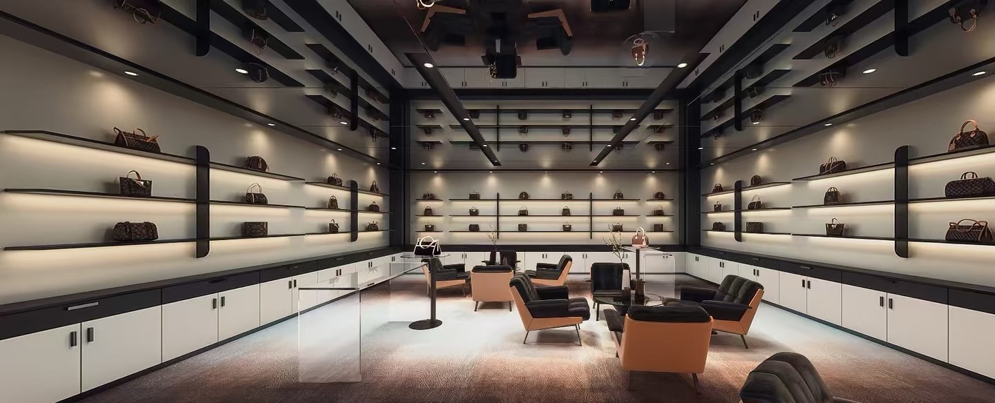 The WATCHMILL showroom — watches and leather goods displayed in warm, museum-style lighting